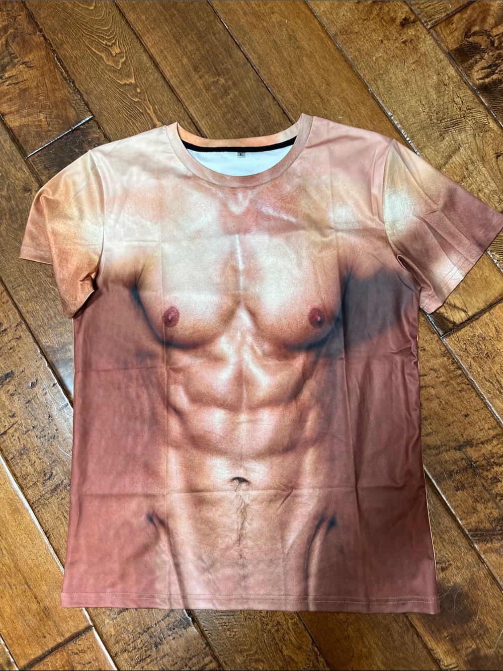 Graphic Muscle Torso Print Tee. Men’s large